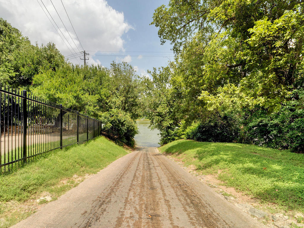 Gated entrance road to the private Apache Shores boat ramp