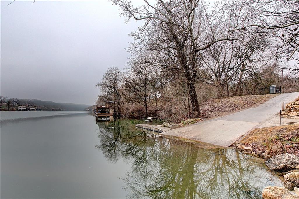 The Apache Shores concrete boat ramp at the water's edge on a still winter morning